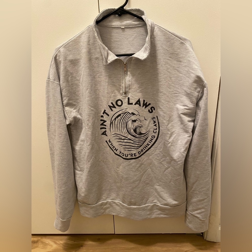 White claw sweater